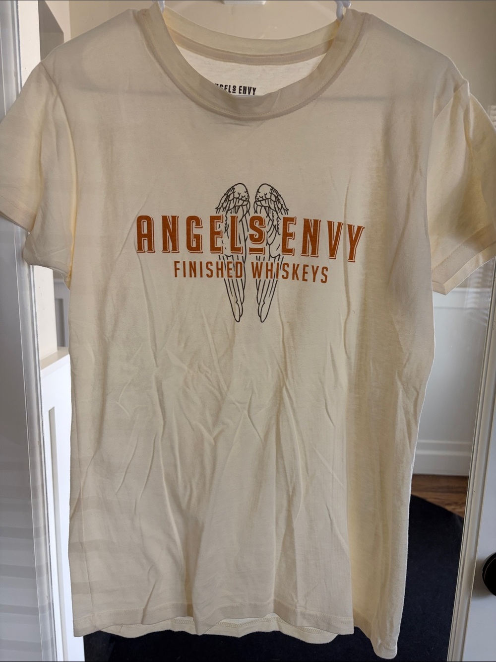 Angels Cream Tee with Orange Angels Envy Logo